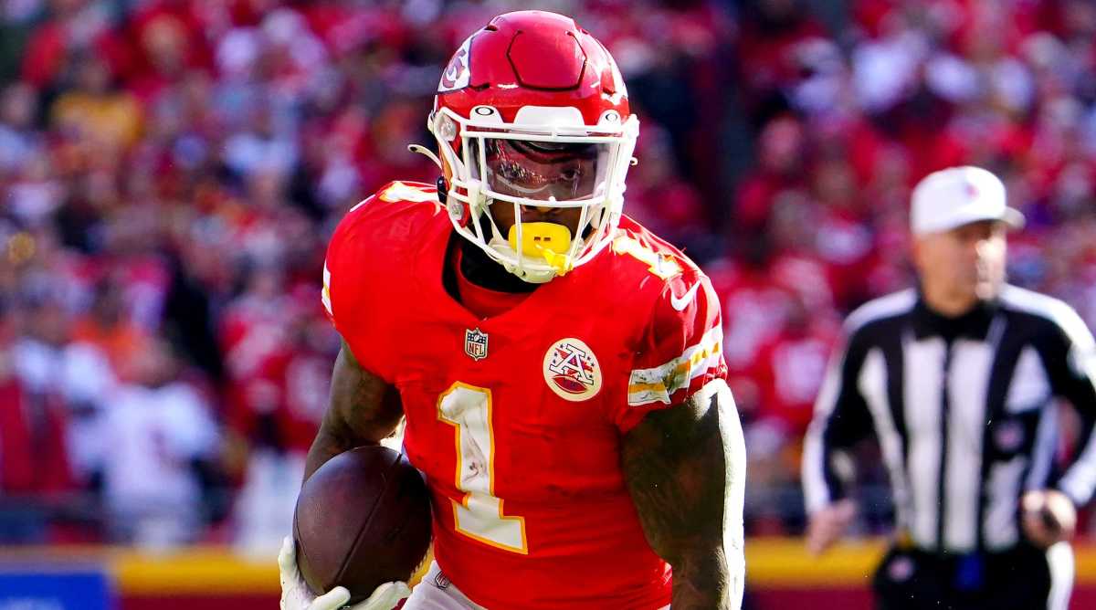Jerick McKinnon runs the football